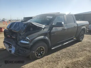 2017 Ram 1500 Rebel z VIN 1C6RR7YT3HS589170, wystawiony jako Copart lot #57115335 z przebiegiem 53 389 mil mil oraz Szkoda całkowita • Salvage title. Historia ofert i sprzedaży dostępna na DreamBid. Obrazek 1.