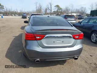 2016 Nissan Maxima SL z VIN 1N4AA6AP8GC417817, wystawiony jako IAAI lot #41772451 z przebiegiem 78 880 mil mil oraz . Historia ofert i sprzedaży dostępna na DreamBid. Obrazek 16.