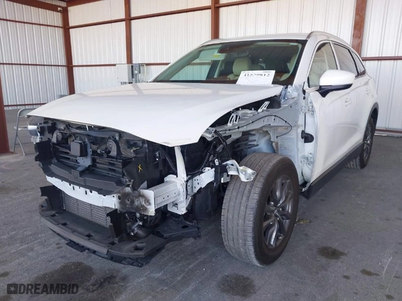 2021 Mazda CX-9 Touring with VIN JM3TCACY2M0507782, listed as a IAAI auction lot 41839812 with 53,418 mi miles. Bid and sale history available at carsss.com. Image 6.