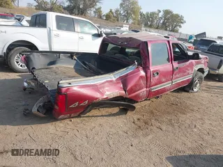 2004 Chevrolet Silverado 2500 LT z VIN 1GCGK23U04F185494, wystawiony jako IAAI lot #40544442 z przebiegiem Nie podano mil oraz . Historia ofert i sprzedaży dostępna na DreamBid. Obrazek 4.
