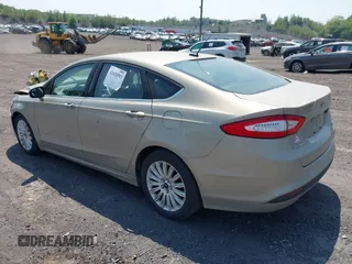 2015 Ford Fusion SE Hybrid z VIN 3FA6P0LU3FR163695, wystawiony jako IAAI lot #42428393 z przebiegiem 237 835 mil mil oraz . Historia ofert i sprzedaży dostępna na DreamBid. Obrazek 3.