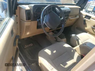 2002 Jeep Wrangler X with VIN 1J4FA39S32P735671, listed as a Copart auction lot 68236084 with 137,587 mi miles and Salvage Title. Bid and sale history available at carsss.com. Image 8.