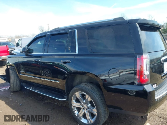 2017 GMC Yukon Denali with VIN 1GKS2CKJ0HR185365, listed as a IAAI auction lot 41856187 with 107,641 mi miles. Bid and sale history available at carsss.com. Image 13.