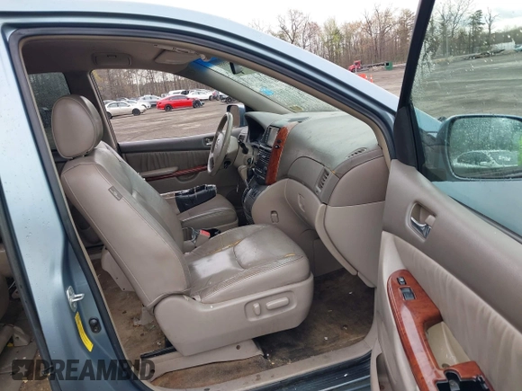 2005 Toyota Sienna XLE with VIN 5TDZA22C95S386560, listed as a IAAI auction lot 41943555 with 230,708 mi miles and . Bid and sale history available at DreamBid. Image 5.