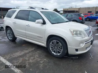 2012 GMC Acadia Denali with VIN 1GKKVTEDXCJ318279, listed as a IAAI auction lot 41812617 with 184,879 mi miles. Bid and sale history available at carsss.com. Image 1.
