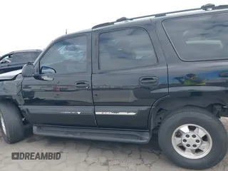 2005 Chevrolet Tahoe Z71 with VIN 1GNEC13TX5R145310, listed as a IAAI auction lot 42056793 with 159,002 mi miles and . Bid and sale history available at DreamBid. Image 13.
