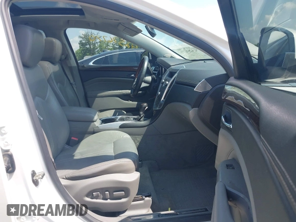 2010 Cadillac SRX Premium Collection with VIN 3GYFNFEY1AS575046, listed as a IAAI auction lot 42576770 with 135,129 mi miles and . Bid and sale history available at DreamBid. Image 5.