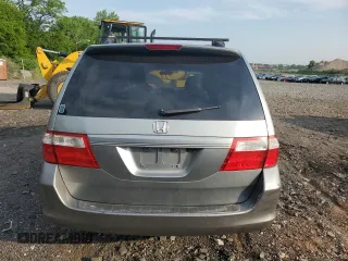 2006 Honda Odyssey EX-L z VIN 5FNRL386X6B031503, wystawiony jako Copart lot #59791425 z przebiegiem 138 624 mil mil oraz Czysty tytuł • Clean title. Historia ofert i sprzedaży dostępna na DreamBid. Obrazek 6.