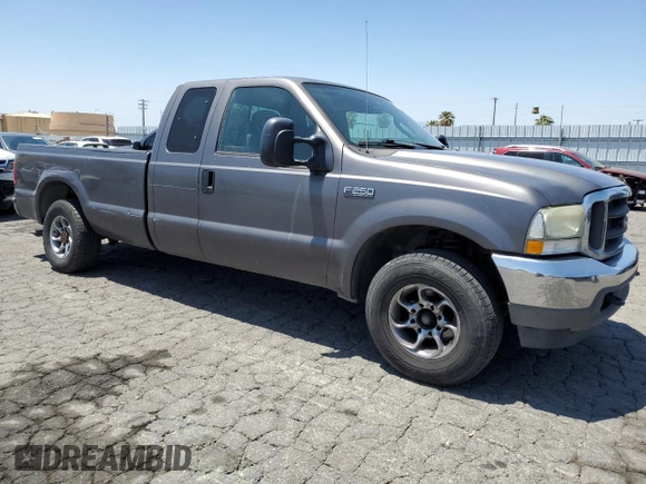 2004 Ford F-250 XL with VIN 1FTNX20L64EB19073, listed as a Copart auction lot 57533145 with 287,118 mi miles and Salvage title. Bid and sale history available at DreamBid. Image 4.