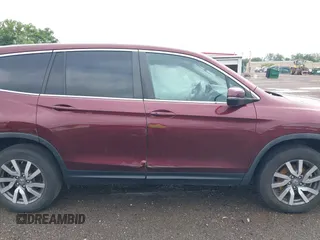 2021 Honda Pilot EX-L with VIN 5FNYF6H53MB094015, listed as a IAAI auction lot 42545722 with 66,065 mi miles and . Bid and sale history available at DreamBid. Image 13.
