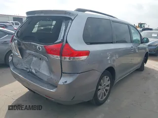 2011 Toyota Sienna XLE with VIN 5TDDK3DC0BS016250, listed as a IAAI auction lot 42156903 with 201,821 mi miles and . Bid and sale history available at DreamBid. Image 4.
