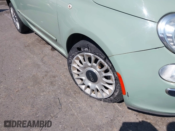 2013 FIAT 500 Lounge with VIN 3C3CFFCR5DT739516, listed as a IAAI auction lot 42439476 with 62,919 mi miles and . Bid and sale history available at DreamBid. Image 17.