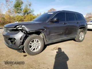 2022 Jeep Grand Cherokee Laredo with VIN 1C4RJHAG4N8612550, listed as a Copart auction lot 77351844 with 32,317 mi miles and Salvage title. Bid and sale history available at DreamBid. Image 1.