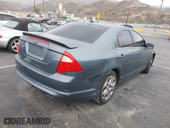 2011 Ford Fusion SE with VIN 3FAHP0HA4BR242326, listed as a IAAI auction lot 41511359 with 181,557 mi miles. Bid and sale history available at carsss.com. Image 4.