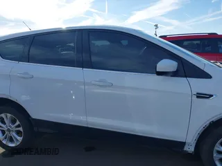 2017 Ford Escape SE z VIN 1FMCU0GD4HUC98899, wystawiony jako IAAI lot #41633762 z przebiegiem 72 245 mil mil oraz . Historia ofert i sprzedaży dostępna na DreamBid. Obrazek 14.