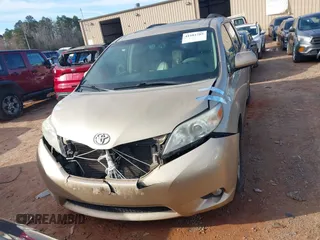 2011 Toyota Sienna XLE AAS with VIN 5TDYK3DCXBS117023, listed as a IAAI auction lot 41581785 with 216,341 mi miles. Bid and sale history available at carsss.com. Image 12.