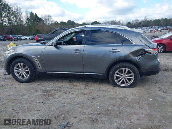 2015 Infiniti QX70 with VIN JN8CS1MWXFM480906, listed as a IAAI auction lot 41177811 with 176,527 mi miles and . Bid and sale history available at DreamBid. Image 14.