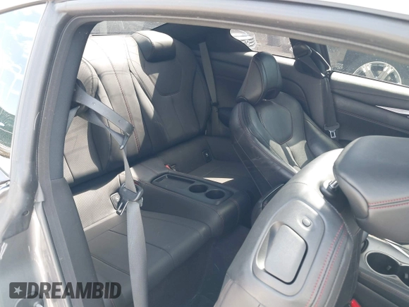 2021 Infiniti Q60 Red Sport 400 with VIN JN1FV7LLXMM560314, listed as a IAAI auction lot 41930067 with 47,818 mi miles and . Bid and sale history available at DreamBid. Image 8.