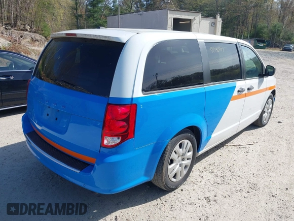 2019 Dodge Grand Caravan SE with VIN 2C4RDGBG8KR646829, listed as a IAAI auction lot 42136947 with 73,015 mi miles and . Bid and sale history available at DreamBid. Image 4.
