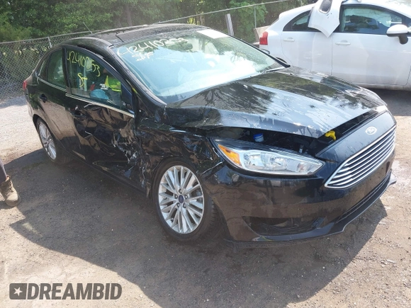 2018 Ford Focus Titanium with VIN 1FADP3J22JL220986, listed as a IAAI auction lot 42410253 with 40,791 mi miles and . Bid and sale history available at DreamBid. Image 1.