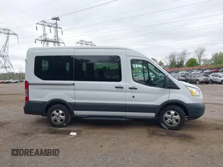 2017 Ford Transit Passenger XL z VIN 1FMZK1CM8HKA67270, wystawiony jako IAAI lot #42074459 z przebiegiem 50 461 mil mil oraz . Historia ofert i sprzedaży dostępna na DreamBid. Obrazek 14.