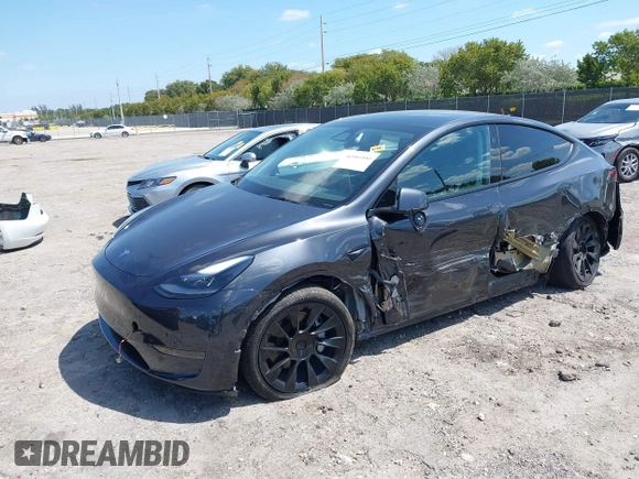 2024 Tesla Model Y with VIN 7SAYGDED3RF019063, listed as a IAAI auction lot 42061888 with 13,763 mi miles and . Bid and sale history available at DreamBid. Image 16.