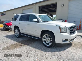 2018 GMC Yukon SLT z VIN 1GKS1BKC5JR255561, wystawiony jako IAAI lot #42212817 z przebiegiem 103 463 mil mil oraz . Historia ofert i sprzedaży dostępna na DreamBid. Obrazek 1.
