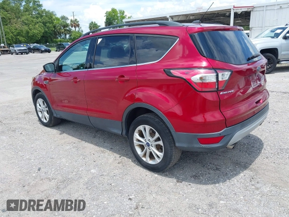 2017 Ford Escape SE z VIN 1FMCU0G95HUE86116, wystawiony jako IAAI lot #42397021 z przebiegiem 115 573 mil mil oraz . Historia ofert i sprzedaży dostępna na DreamBid. Obrazek 3.