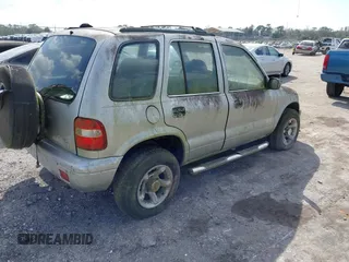 2001 Kia Sportage with VIN KNDJB723115706221, listed as a IAAI auction lot 41562713 with 99,378 mi miles. Bid and sale history available at carsss.com. Image 4.