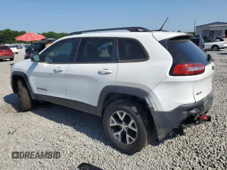 2015 Jeep Cherokee Trailhawk with VIN 1C4PJMBB1FW771865, listed as a Copart auction lot 61905315 with 99,554 mi miles and Clean title. Bid and sale history available at DreamBid. Image 2.