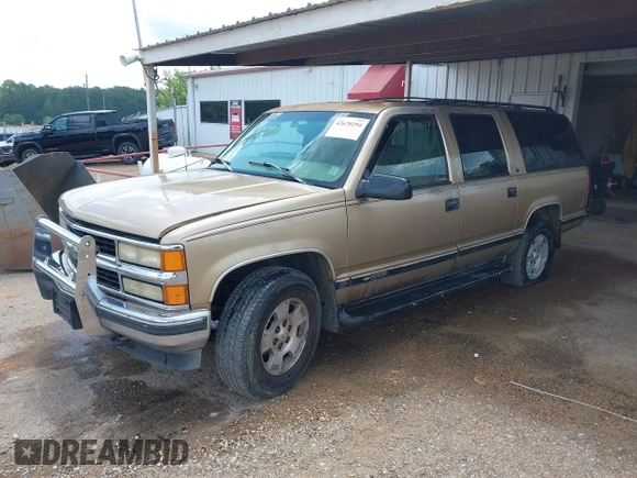 1999 Chevrolet Suburban with VIN 1GNFK16RXXJ416360, listed as a IAAI auction lot 42670294 with 319,691 mi miles and . Bid and sale history available at DreamBid. Image 2.
