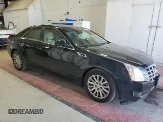2013 Cadillac CTS Luxury z VIN 1G6DG5E57D0112818, wystawiony jako Copart lot #57937755 z przebiegiem 148 751 mil mil oraz Czysty tytuł • Clean title. Historia ofert i sprzedaży dostępna na DreamBid. Obrazek 4.