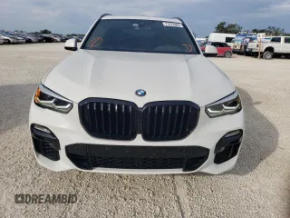 2020 BMW X5 sDrive40i with VIN 5UXCR4C02LLW63576, listed as a Copart auction lot 71912802 with 27,686 mi miles. Bid and sale history available at carsss.com. Image 5.