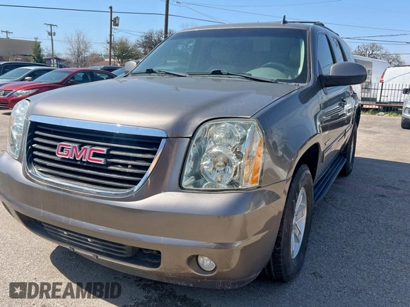 2012 GMC Yukon SLT with VIN 1GKS1CE05CR141571, listed as a Copart auction lot 49110005 with 116,634 mi miles and Clean Title. Bid and sale history available at carsss.com. Image 2.