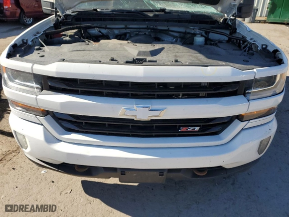 2016 Chevrolet Silverado 1500 LT with VIN 3GCUKREC8GG330137, listed as a Copart auction lot 53310775 with 111,624 mi miles and Salvage Title. Bid and sale history available at carsss.com. Image 11.