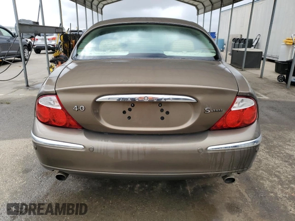 2001 Jaguar S-Type with VIN SAJDA01P21GM04051, listed as a Copart auction lot 46668745 with 81,765 mi miles and Salvage Title. Bid and sale history available at DreamBid. Image 6.