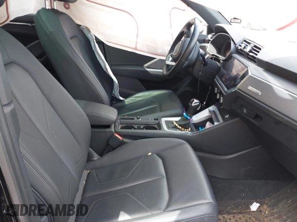 2022 Audi Q3 Premium with VIN WA1AUCF37N1031270, listed as a IAAI auction lot 42297083 with 36,620 mi miles and . Bid and sale history available at DreamBid. Image 5.
