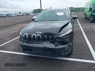 2015 Jeep Cherokee Latitude with VIN 1C4PJLCB5FW689811, listed as a IAAI auction lot 42113567 with 113,740 mi miles and . Bid and sale history available at carsss.com. Image 12.