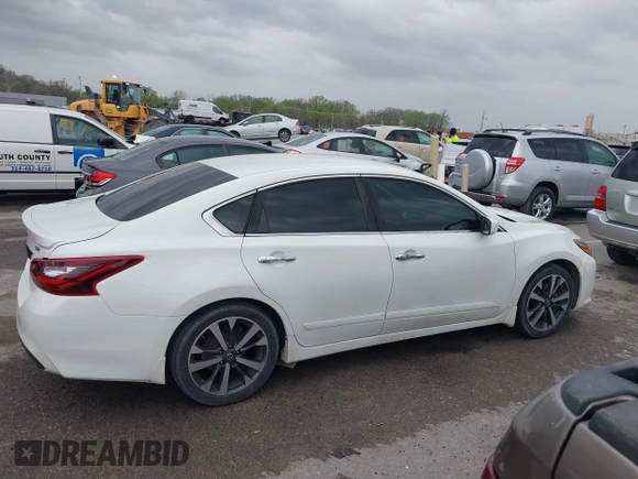 2017 Nissan Altima SR with VIN 1N4AL3AP0HN345977, listed as a IAAI auction lot 41937530 with 121,292 mi miles and . Bid and sale history available at carsss.com. Image 13.