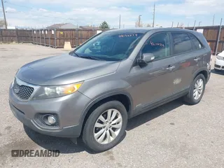2011 Kia Sorento EX with VIN 5XYKUDA29BG010219, listed as a IAAI auction lot 42106579 with 233,350 mi miles. Bid and sale history available at carsss.com. Image 2.