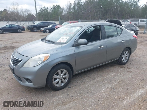 2013 Nissan Versa SV with VIN 3N1CN7AP2DL822216, listed as a IAAI auction lot 41667978 with 194,281 mi miles and . Bid and sale history available at DreamBid. Image 2.