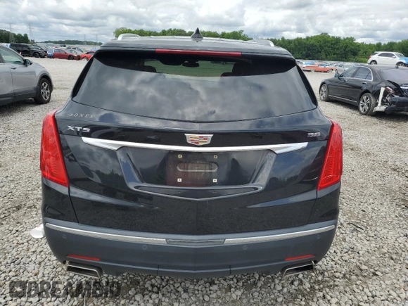 2019 Cadillac XT5 Luxury FWD с VIN 1GYKNCRS7KZ104400, выставлен на аукционе Copart как лот 58704715 с пробегом 80 676 миль миль и Списание • Salvage title. История ставок и продаж доступна на DreamBid. Изображение 6.