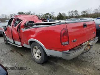 1999 Ford F-150 with VIN 1FTRX17W3XNA26575, listed as a Copart auction lot 81508484 with 138,704 mi miles and Salvage title. Bid and sale history available at DreamBid. Image 2.