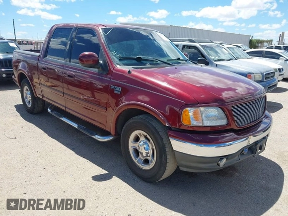 2003 Ford F-150 XLT with VIN 1FTRW07693KC11903, listed as a IAAI auction lot 41993455 with 301,023 mi miles. Bid and sale history available at carsss.com. Image 1.