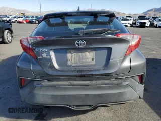 2021 Toyota C-HR LE z VIN NMTKHMBX8MR130564, wystawiony jako Copart lot #56711535 z przebiegiem 94 007 mil mil oraz Szkoda całkowita • Salvage title. Historia ofert i sprzedaży dostępna na DreamBid. Obrazek 6.