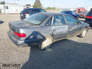1993 Ford Taurus GL with VIN 1FALP5240PG327124, listed as a IAAI auction lot 42074204 with 27,681 mi miles. Bid and sale history available at carsss.com. Image 4.