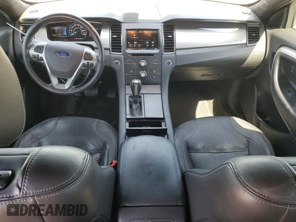 2015 Ford Taurus SEL with VIN 1FAHP2E8XFG209390, listed as a Copart auction lot 58992305 with 99,498 mi miles and Salvage title. Bid and sale history available at DreamBid. Image 8.