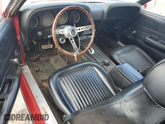 1969 Ford Mustang с VIN 9T03F120746, выставлен на аукционе Copart как лот 51998695 с пробегом 91 574 миль миль и Списание • Salvage title. История ставок и продаж доступна на DreamBid. Изображение 8.