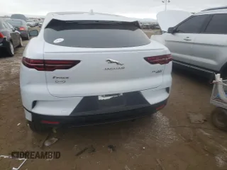 2020 Jaguar I-Pace SE z VIN SADHC2S13L1F85464, wystawiony jako Copart lot #81758543 z przebiegiem 32 784 mil mil oraz . Historia ofert i sprzedaży dostępna na DreamBid. Obrazek 6.