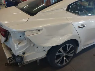 2017 Nissan Maxima SV with VIN 1N4AA6AP7HC434741, listed as a IAAI auction lot 40810102 with 80,187 mi miles and . Bid and sale history available at DreamBid. Image 18.